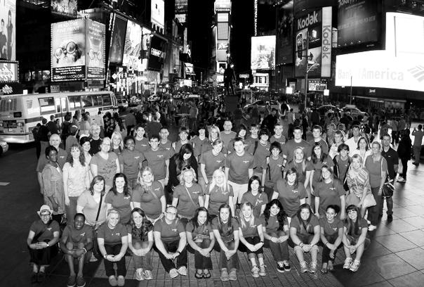 Choir students sitting in Times Square.     COURTESY PHOTO