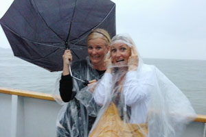 Journalism adviser Amy Neese and Midway teacher Misti Johnson endure a stormy sail to the Statue of Liberty and Ellis Island.