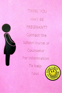Signs found in the womens restrooms offer help and guidance from counselors and the nurse. 