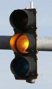 Yellow lights increase stress on the road. 
