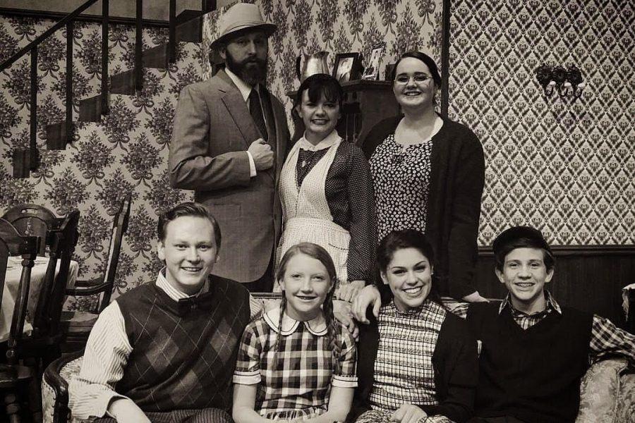 Sophomore Brooklyn Hall poses with the Brighton Beach Memoirs cast.
