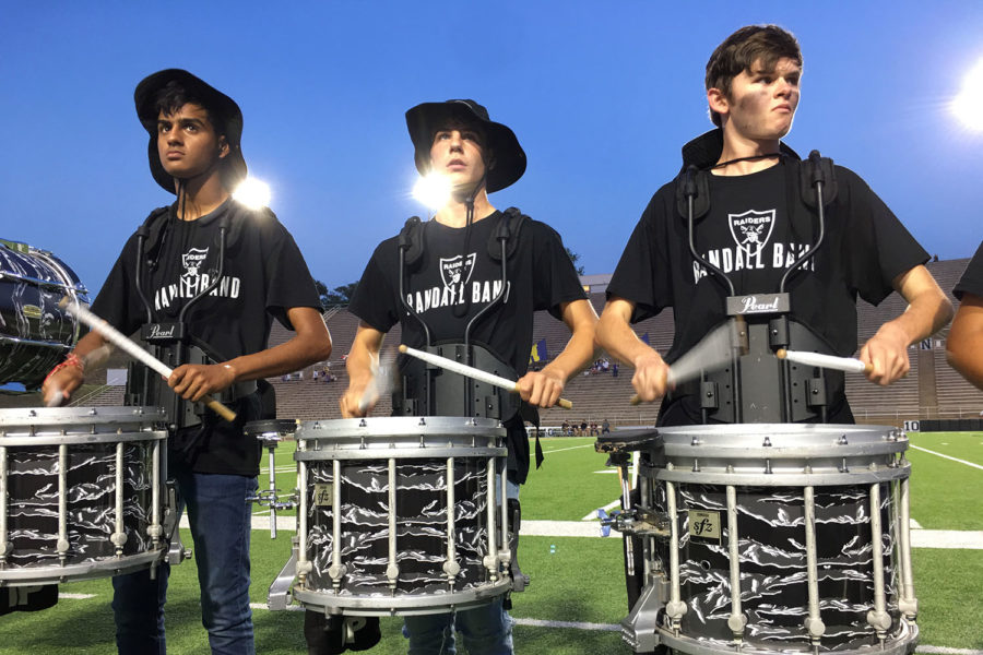 Band%2C+fans+support+the+varsity+football+team+during+the+Sept.+30+game+at+Kimbrough+Stadium.+