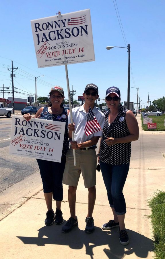 Sophomore Adrian Avila campaigns with other Jackson supporters on the streets of Amarillo. 