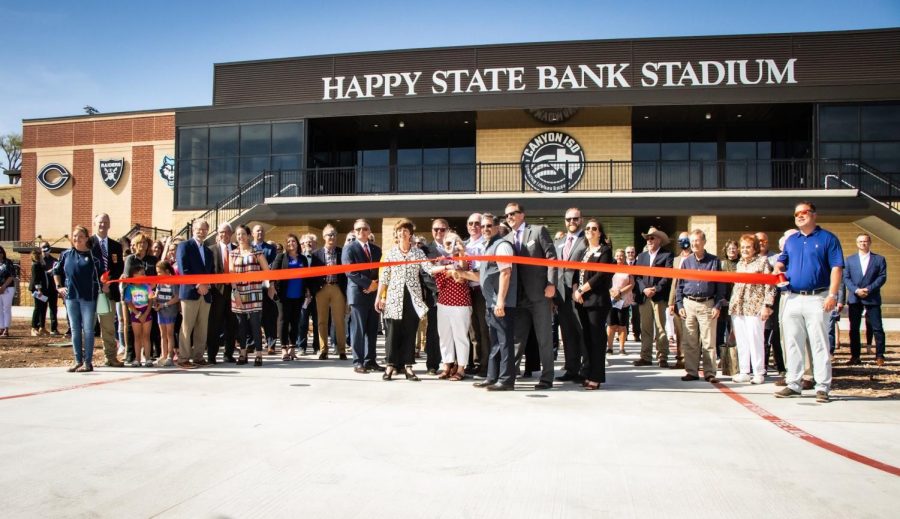 Members from Canyon Independent School District and Happy State Bank held a ribbon-cutting ceremony to open the Happy State Bank Stadium. 