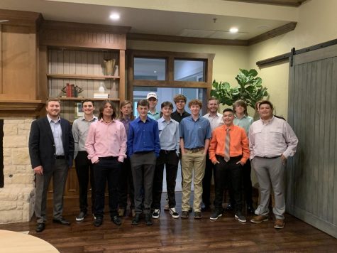 The golf team gathers for their end of year banquet.