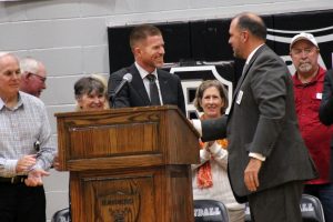 Principal Steven Singleton congratulates Doctor Chad Hanson on becoming Randalls newest Hall of Fame Inductee on Sept. 16. Hanson is Randalls 26th Hall of Fame member. One Randall graduate is chosen for the Hall of Fame each year.