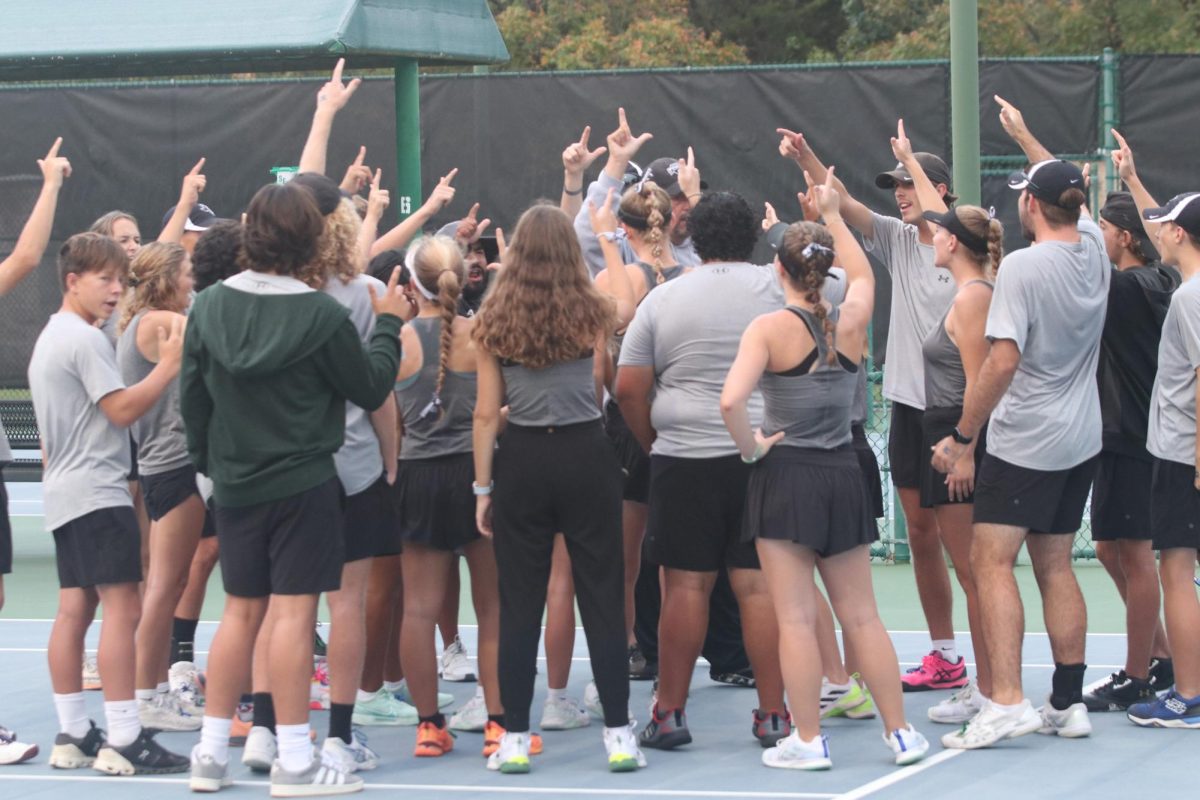 The+tennis+team+gets+ready+to+play+at+the+team+tennis+state+tournament+in+Waco.